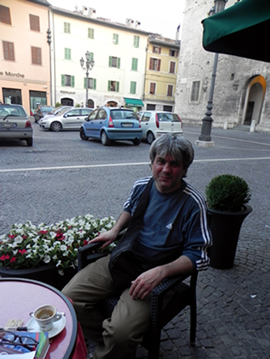 Paolo relaxes in piazza.